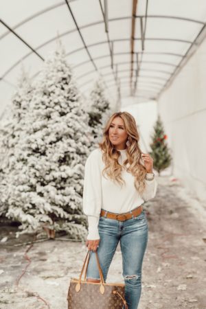 Casual holiday outfit idea with white boots